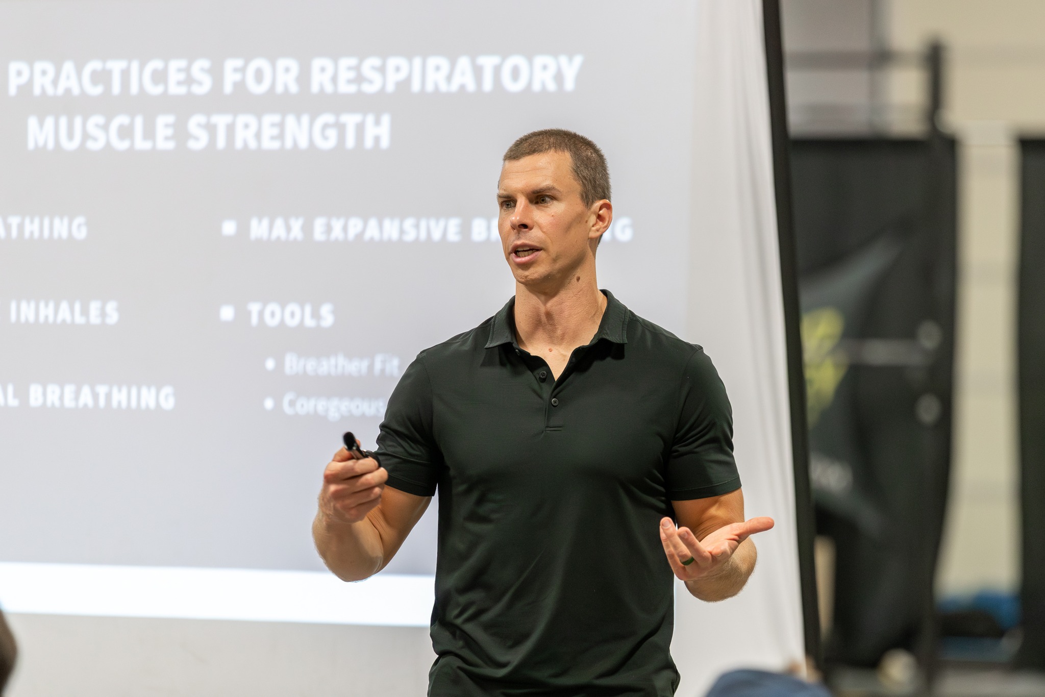 Coach Zack giving a presentation on respiratory muscle strength
